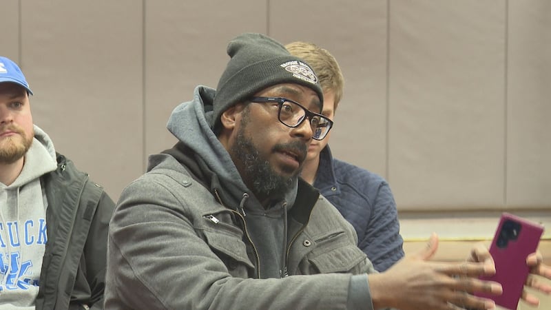 George Washington Carver parent speaks during community meeting