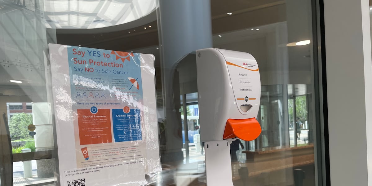 Sunscreen Sign Construction UK Med students create sunscreen dispensers; bridge gaps in accessibility
