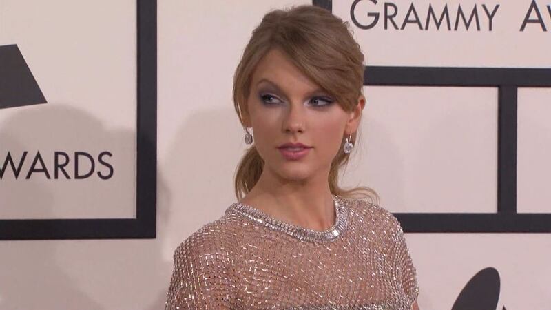 Taylor Swift tops Whitney Houston's record for most weeks at No. 1 on the Billboard 200 chart.