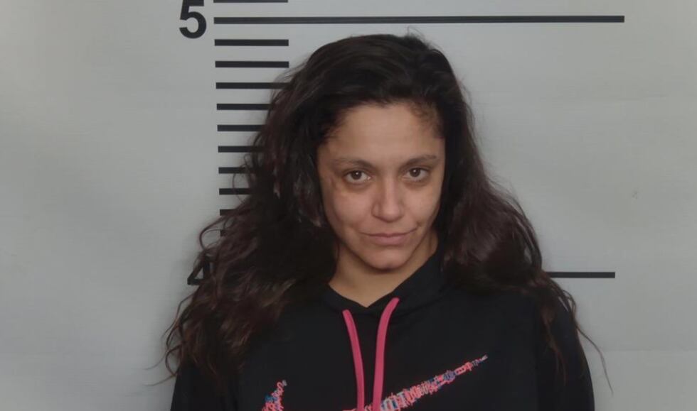 Woman arrested in connection with murder near Lexington motel