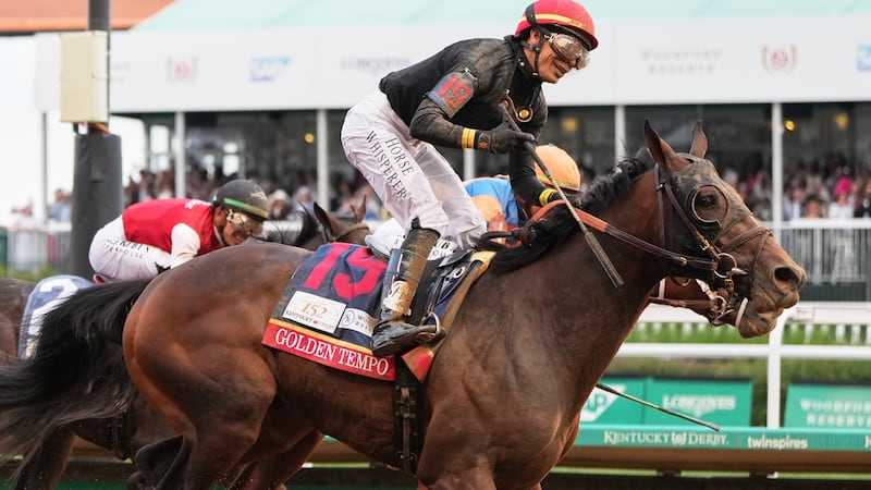 Golden Tempo (19) ridden by Jose L. Ortiz wins the 152nd running of the Kentucky Derby horse...